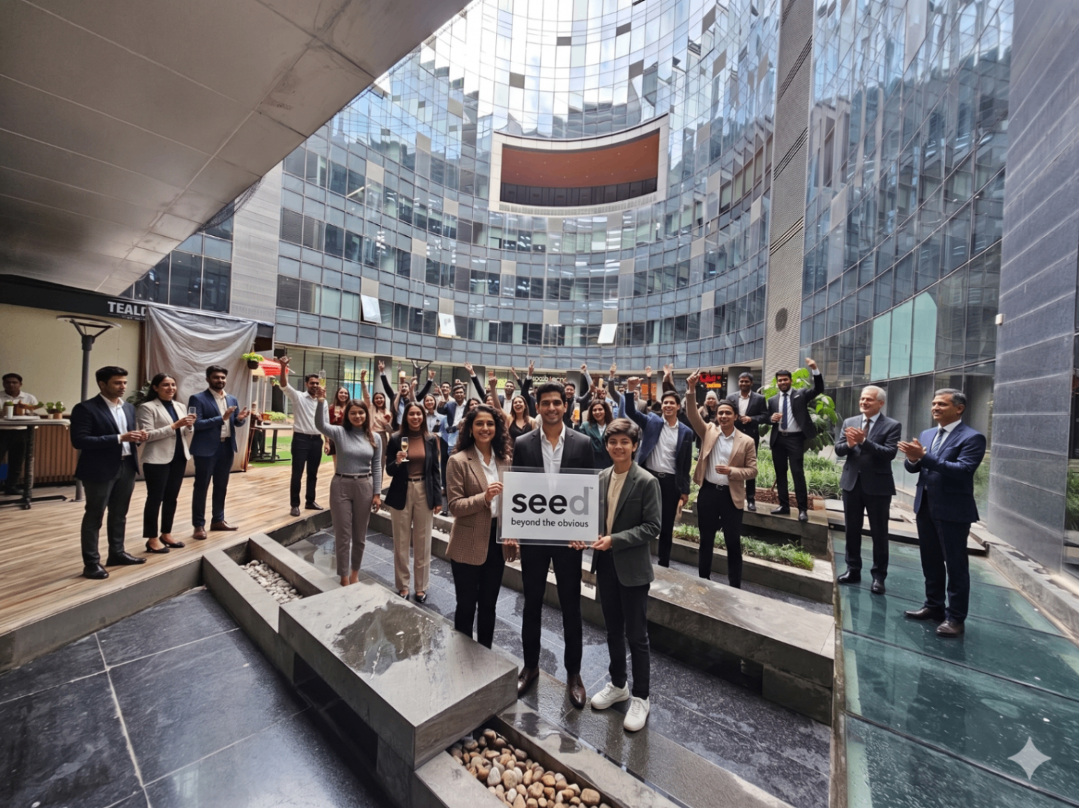 SEED team celebration in office courtyard
